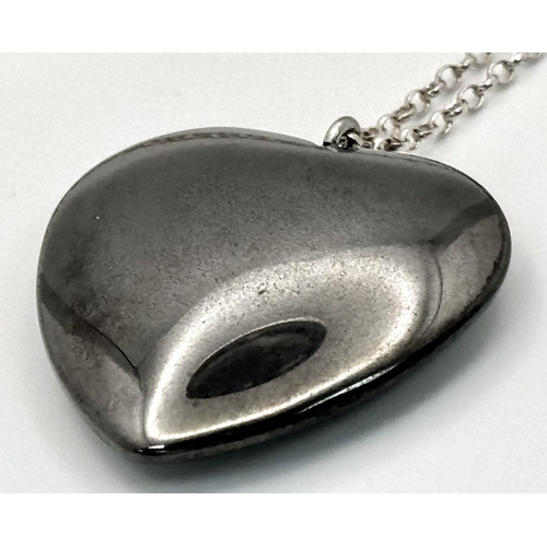 1818 - A Hematite large Heart pendant on 925 silver belcher chain. Total weight 23.9G. Total length 52cm.