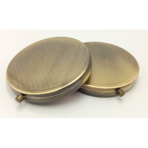 1901 - Two Mock Croc Compacts. Both as new condition. 6.5cm diameter.