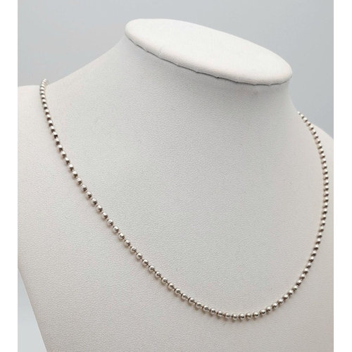 1912 - A Sterling Silver Beaded Necklace. 56cm. 11.2g