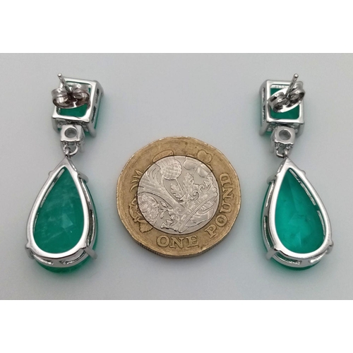 220 - A silver, statement, pair of earrings with green tourmaline in a presentation box. Earrings length: ... 