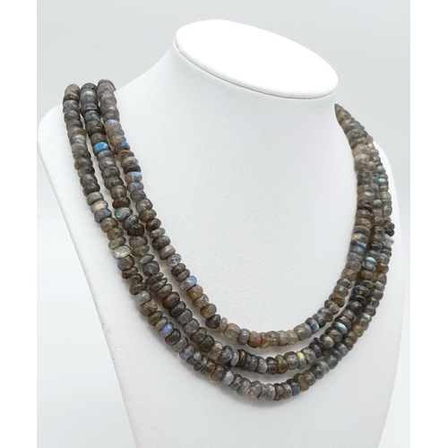 262 - A top quality three-strand labradorite (variety blue flash) necklace, exhibiting excellent iridescen... 