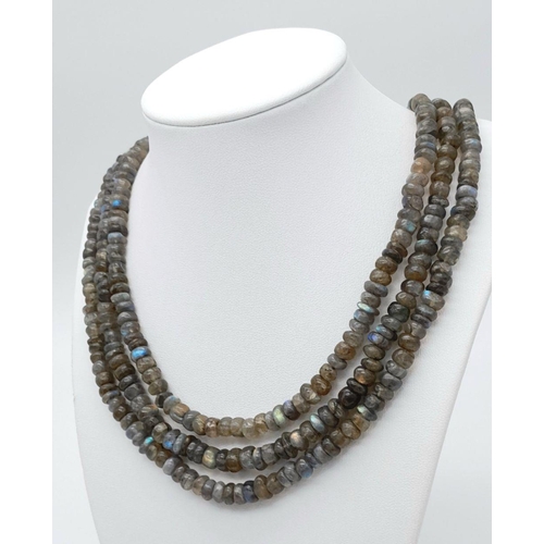 262 - A top quality three-strand labradorite (variety blue flash) necklace, exhibiting excellent iridescen... 