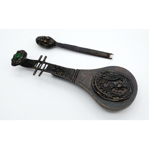 269 - A rare antique Chinese Bronze Chastity belt padlock in the shape of a four-string lute with a green ... 