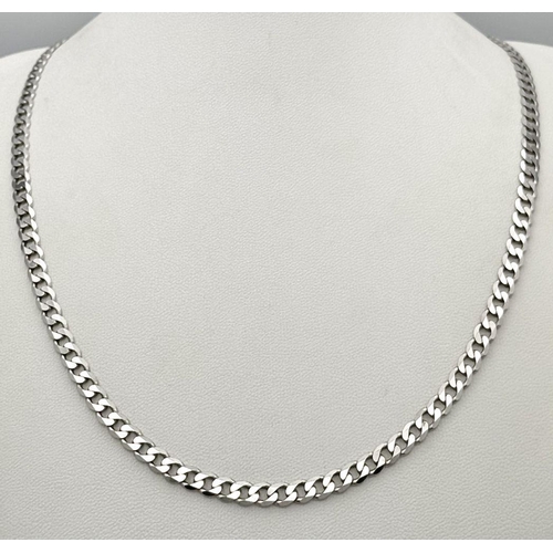 324 - A 9k White Gold Curb Link Chain. 55cm. 18.1g weight. In very good condition.