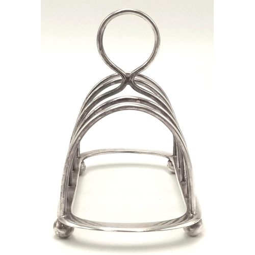 793 - An Antique Sterling Silver Toast Rack. Hallmarks for London 1904. Hukin and Heath makers mark. 10cm.... 