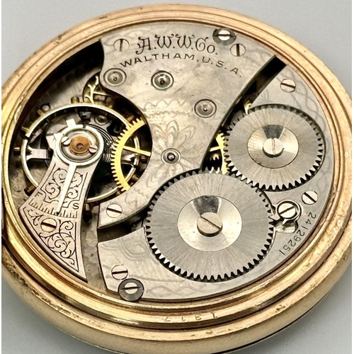 828 - An Antique Gold Plated Waltham Pocket Watch. Top winder. White and pink dial with second sub dial. I... 