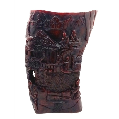 842 - An Antique Chinese Hand-Carved Wooden Libation Cup. Decorated with village scenes. 19 x 13cm.