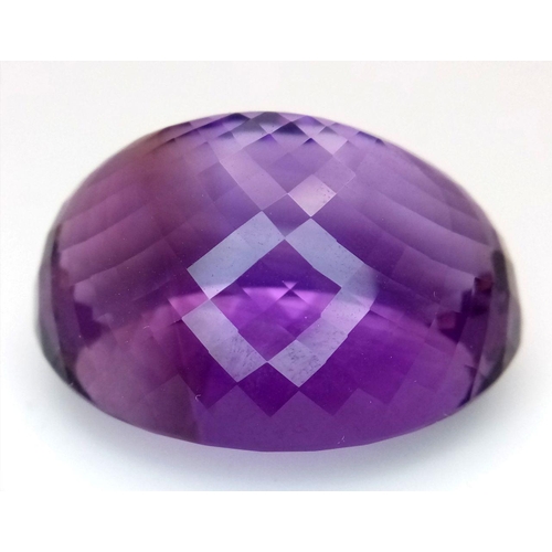 1101 - A 139.65ct natural amethyst gemstone in a rare collector's size, in oval mixed cut. Comes with IGITL... 