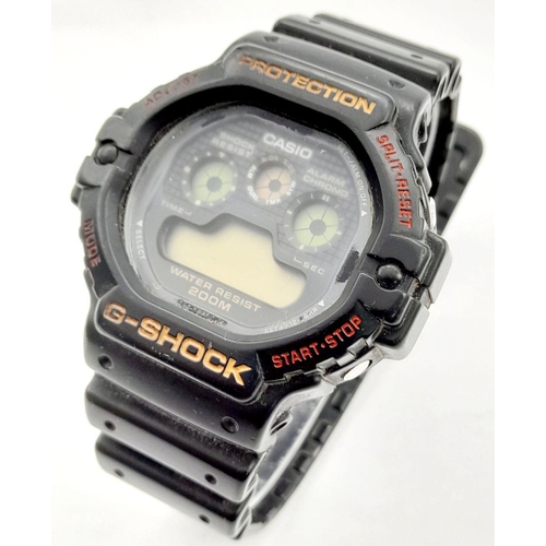 1220 - A Vintage G-Shock Watch. Black rubber strap. 47mm case. As found.