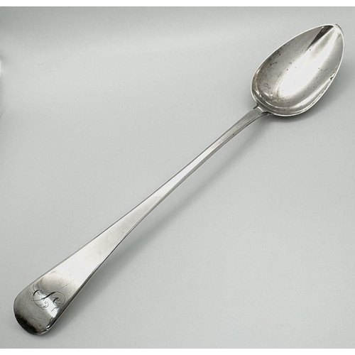 1356 - An antique Georgian sterling silver Basting spoon. Full London hallmarks, 1813. Total weight 107.6G.... 