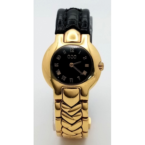 137 - A Versace 18K Gold Limited Edition Horology Quartz Ladies Watch. 18k gold and black leather bracelet... 