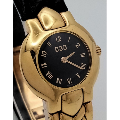 137 - A Versace 18K Gold Limited Edition Horology Quartz Ladies Watch. 18k gold and black leather bracelet... 