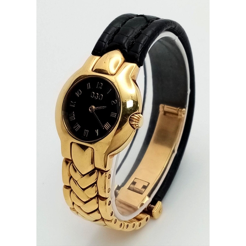 137 - A Versace 18K Gold Limited Edition Horology Quartz Ladies Watch. 18k gold and black leather bracelet... 