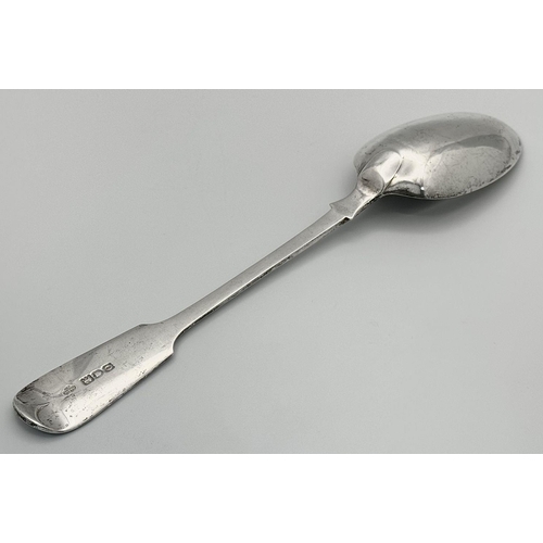 1531 - An antique sterling silver spoon. Full London hallmarks, 1909. Total weight 76.3G. Total length 23cm... 