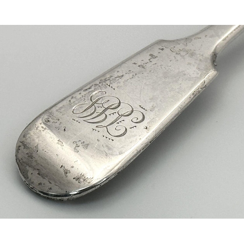 1531 - An antique sterling silver spoon. Full London hallmarks, 1909. Total weight 76.3G. Total length 23cm... 