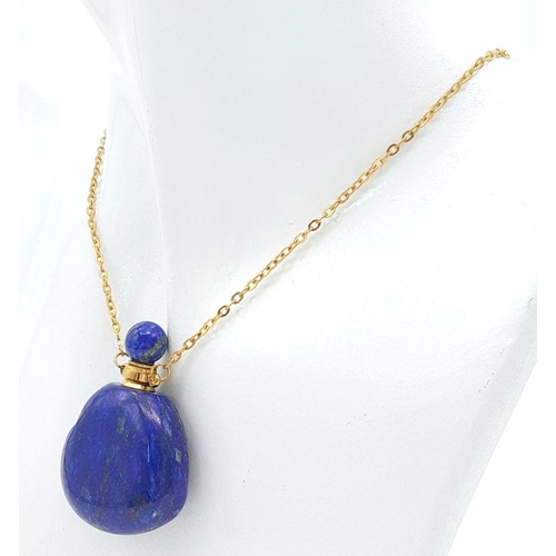 1703 - A lapis lazuli snuff bottle pendant necklace. Necklace approx 57.6cm in length, a 4cm x 3cm pendant ... 