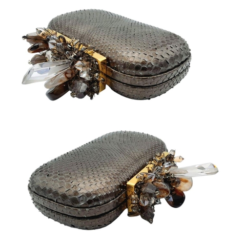 179 - A Madiso Brown Clutch Bag. Python skin exterior with stone embellish clasp fastening closure. Silver... 