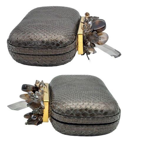 179 - A Madiso Brown Clutch Bag. Python skin exterior with stone embellish clasp fastening closure. Silver... 