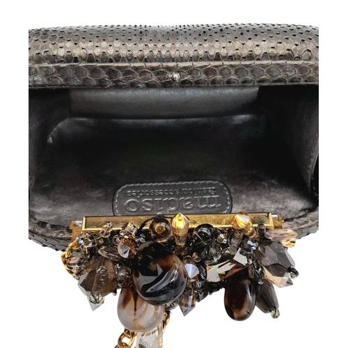 179 - A Madiso Brown Clutch Bag. Python skin exterior with stone embellish clasp fastening closure. Silver... 