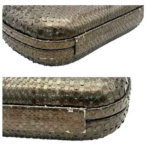 179 - A Madiso Brown Clutch Bag. Python skin exterior with stone embellish clasp fastening closure. Silver... 