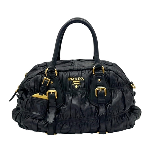 207 - A Prada Black Leather Tote Bag. Ruched leather exterior with gold-toned hardware, dual rolled leathe... 