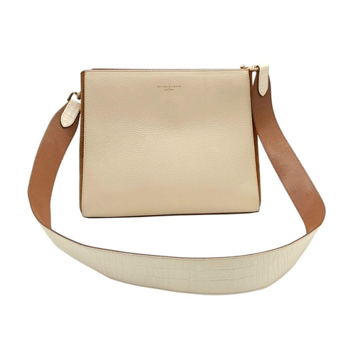 228 - An Aspinal of London Tan and Cream Structured Bag. Cream leather exterior with gold-toned hardware, ... 