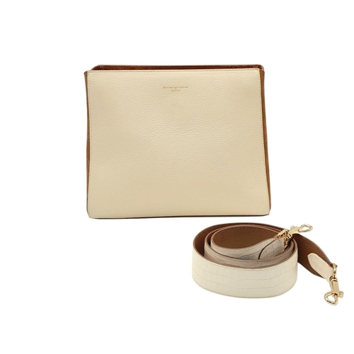 228 - An Aspinal of London Tan and Cream Structured Bag. Cream leather exterior with gold-toned hardware, ... 