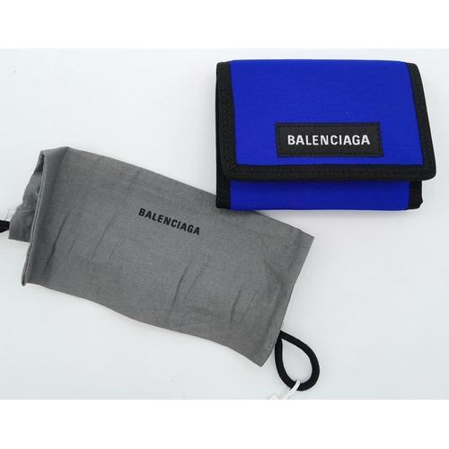 242 - A Balenciaga Nylon Trifold Wallet. Blue and black textile exterior with a velcro closure. Black text... 