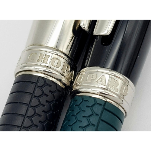 256 - A Wonderful Chopard Pen Set: Chopard palladium plated roller pen and a black lacquer fountain pen wi... 