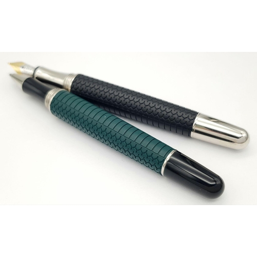 256 - A Wonderful Chopard Pen Set: Chopard palladium plated roller pen and a black lacquer fountain pen wi... 