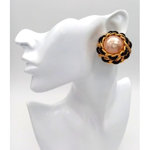 263 - A Pair of Designer Chanel Clip On Earrings. Central faux pearl  with Gold plate and leather trim on ... 