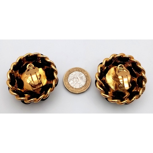 263 - A Pair of Designer Chanel Clip On Earrings. Central faux pearl  with Gold plate and leather trim on ... 