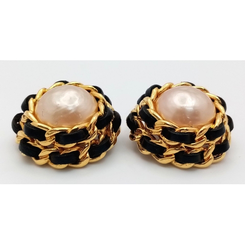 263 - A Pair of Designer Chanel Clip On Earrings. Central faux pearl  with Gold plate and leather trim on ... 