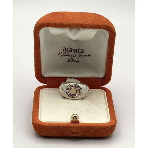 277 - A Hermes Sterling Silver Signet Ring. Size K 1/2. Comes in original Hermes case.  Ref: STK019989