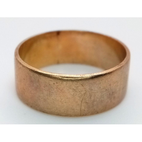 296 - A Vintage 9K Yellow Gold Band Ring. Size O 1/2. 4g. 7mm width.