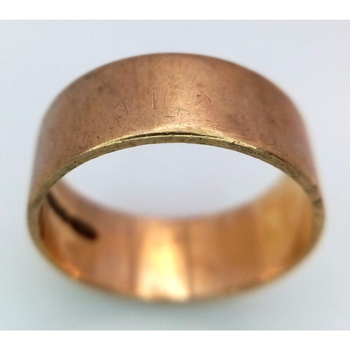 296 - A Vintage 9K Yellow Gold Band Ring. Size O 1/2. 4g. 7mm width.