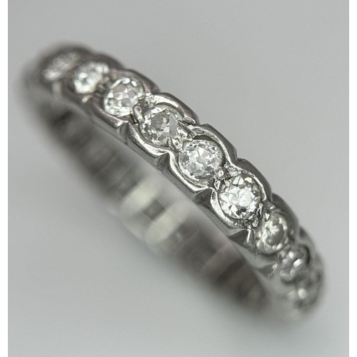 333 - A Platinum and Diamond Full Eternity Ring. Size N. 4.1g total weight.