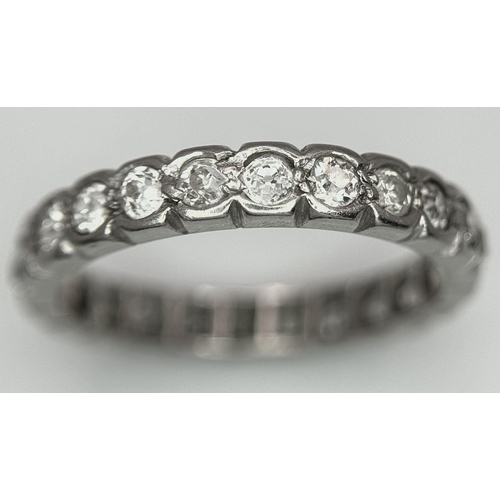 333 - A Platinum and Diamond Full Eternity Ring. Size N. 4.1g total weight.