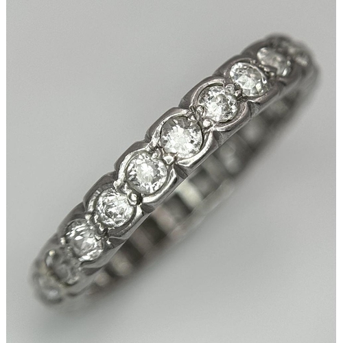 333 - A Platinum and Diamond Full Eternity Ring. Size N. 4.1g total weight.