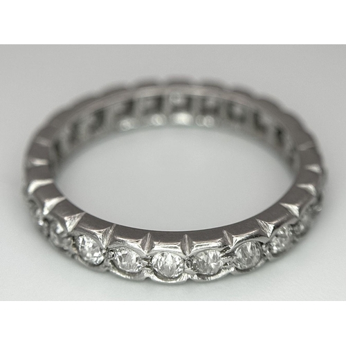 333 - A Platinum and Diamond Full Eternity Ring. Size N. 4.1g total weight.