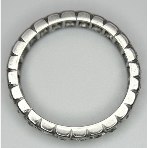 333 - A Platinum and Diamond Full Eternity Ring. Size N. 4.1g total weight.