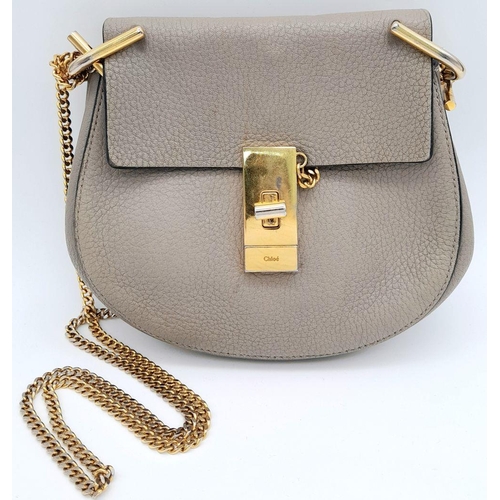 381 - A Chloe Taupe Leather Drew Shoulder Bag. Pebbled taupe leather exterior with gold-toned hardware, a ... 