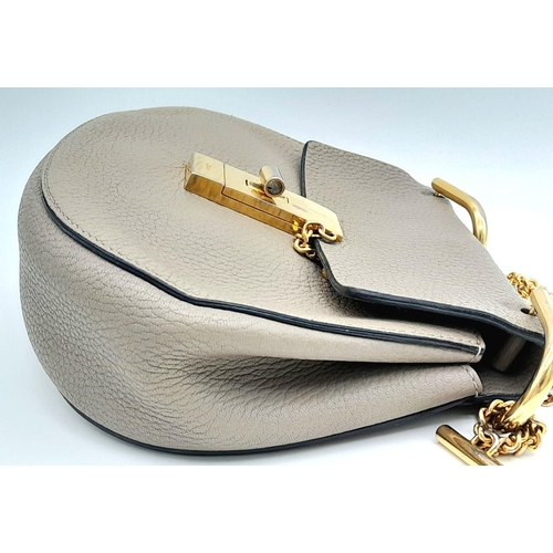 381 - A Chloe Taupe Leather Drew Shoulder Bag. Pebbled taupe leather exterior with gold-toned hardware, a ... 