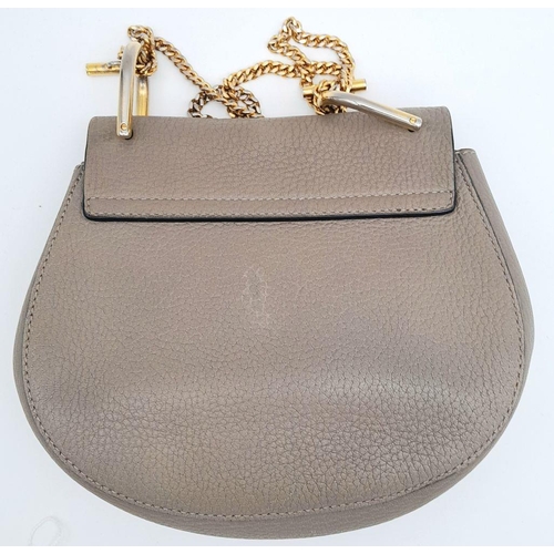 381 - A Chloe Taupe Leather Drew Shoulder Bag. Pebbled taupe leather exterior with gold-toned hardware, a ... 