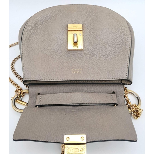 381 - A Chloe Taupe Leather Drew Shoulder Bag. Pebbled taupe leather exterior with gold-toned hardware, a ... 