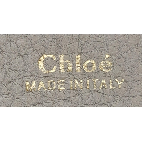 381 - A Chloe Taupe Leather Drew Shoulder Bag. Pebbled taupe leather exterior with gold-toned hardware, a ... 