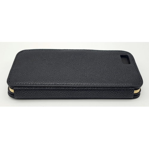 389 - A Chopard Black Phone Case. Approximately 14cm height x 5cm length. In good condition but please see... 