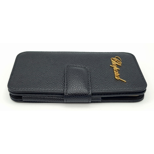 389 - A Chopard Black Phone Case. Approximately 14cm height x 5cm length. In good condition but please see... 