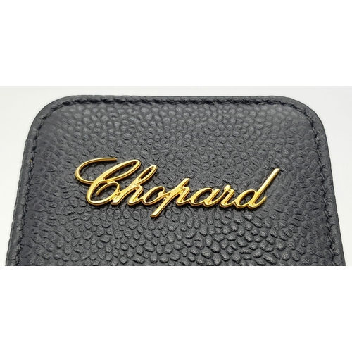 389 - A Chopard Black Phone Case. Approximately 14cm height x 5cm length. In good condition but please see... 