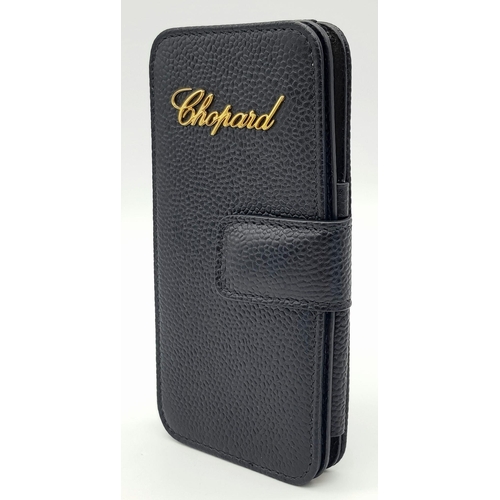 389 - A Chopard Black Phone Case. Approximately 14cm height x 5cm length. In good condition but please see... 